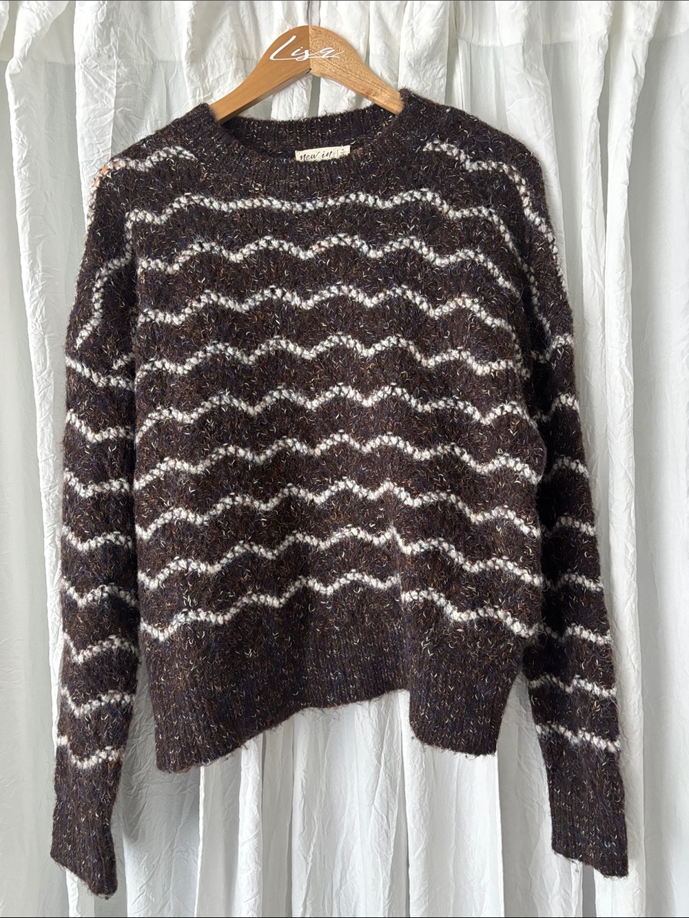Cozy Brown Crewneck Sweater with Cream Wave Stripes